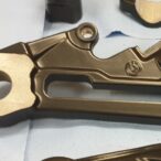 Ankerplatte Bremssattel hinten